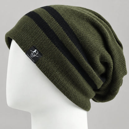 Olive green slouchy beanie with two black stripes and a relaxed back on a mannequin.