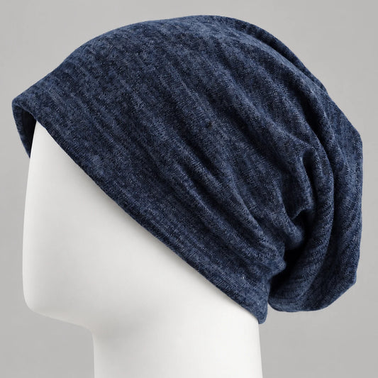 Navy lightweight slouchy beanie with subtle textured pattern and relaxed fit