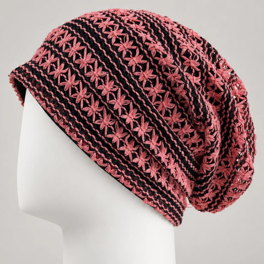 Pink and black floral openwork slouchy beanie with decorative textured pattern