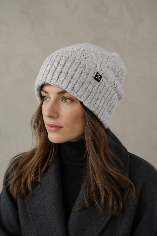 Woman wearing FORBUSITE B5039 light gray fuzzy knit beanie with fleece lining and wide ribbed cuff