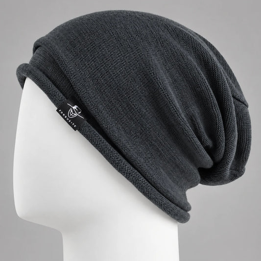 Charcoal knit slouchy beanie with rolled edge and relaxed oversized fit