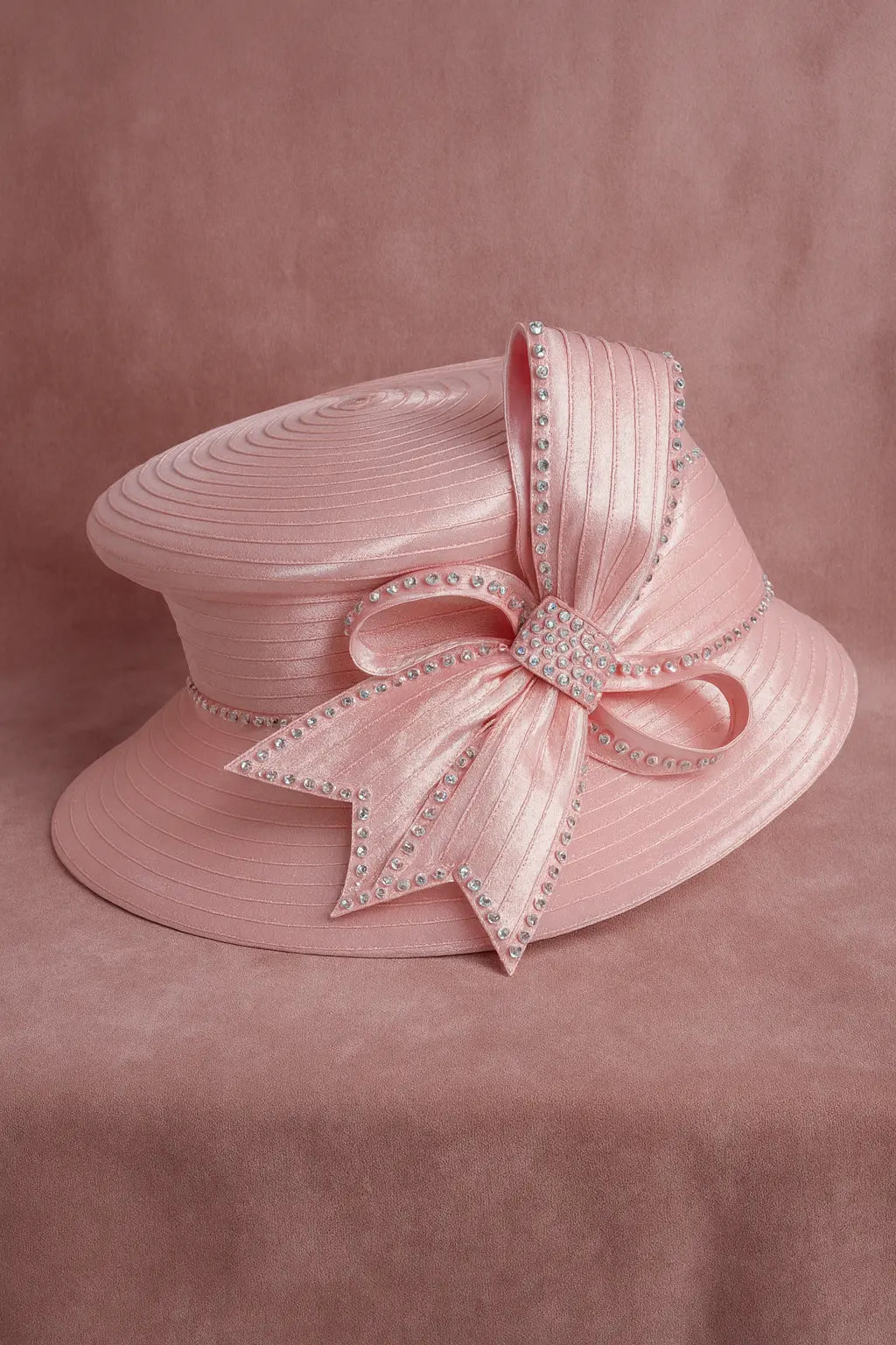 Elegant baby pink church hat for women with rhinestone bow, perfect for Sunday service and formal events.
