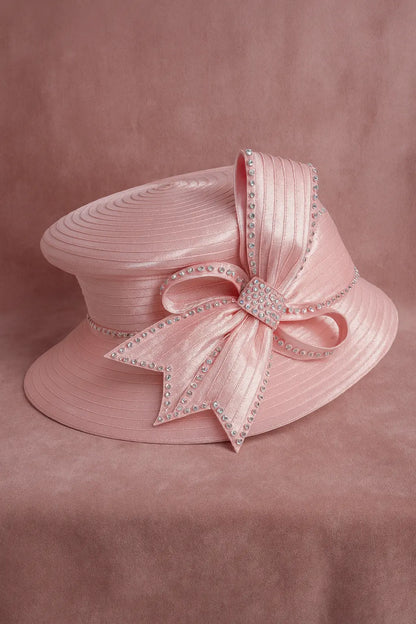 Elegant baby pink church hat for women with rhinestone bow, perfect for Sunday service and formal events.