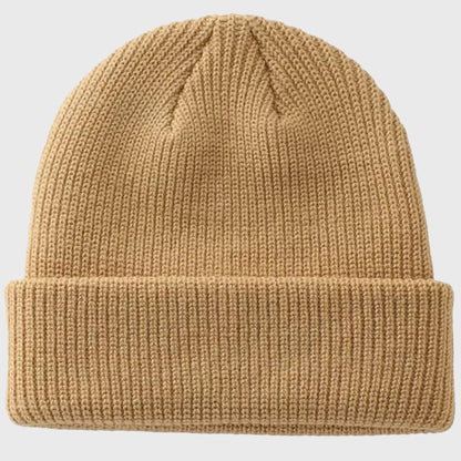 Beige knitted beanie – Classic, versatile style for winter, providing warmth and comfort in any outdoor setting.