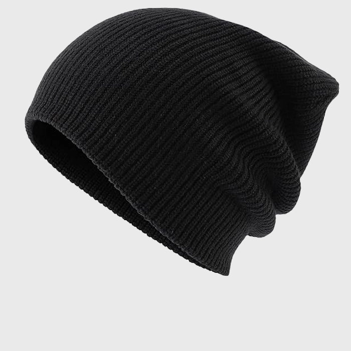 Black slouchy knit beanie – Stylish and comfortable ribbed winter hat, perfect for casual outdoor wear and cold weather protection.
