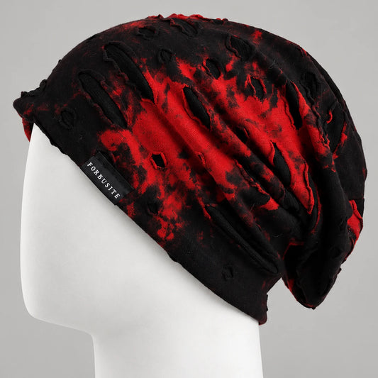 Red and black distressed slouchy beanie with cutout details and oversized drape