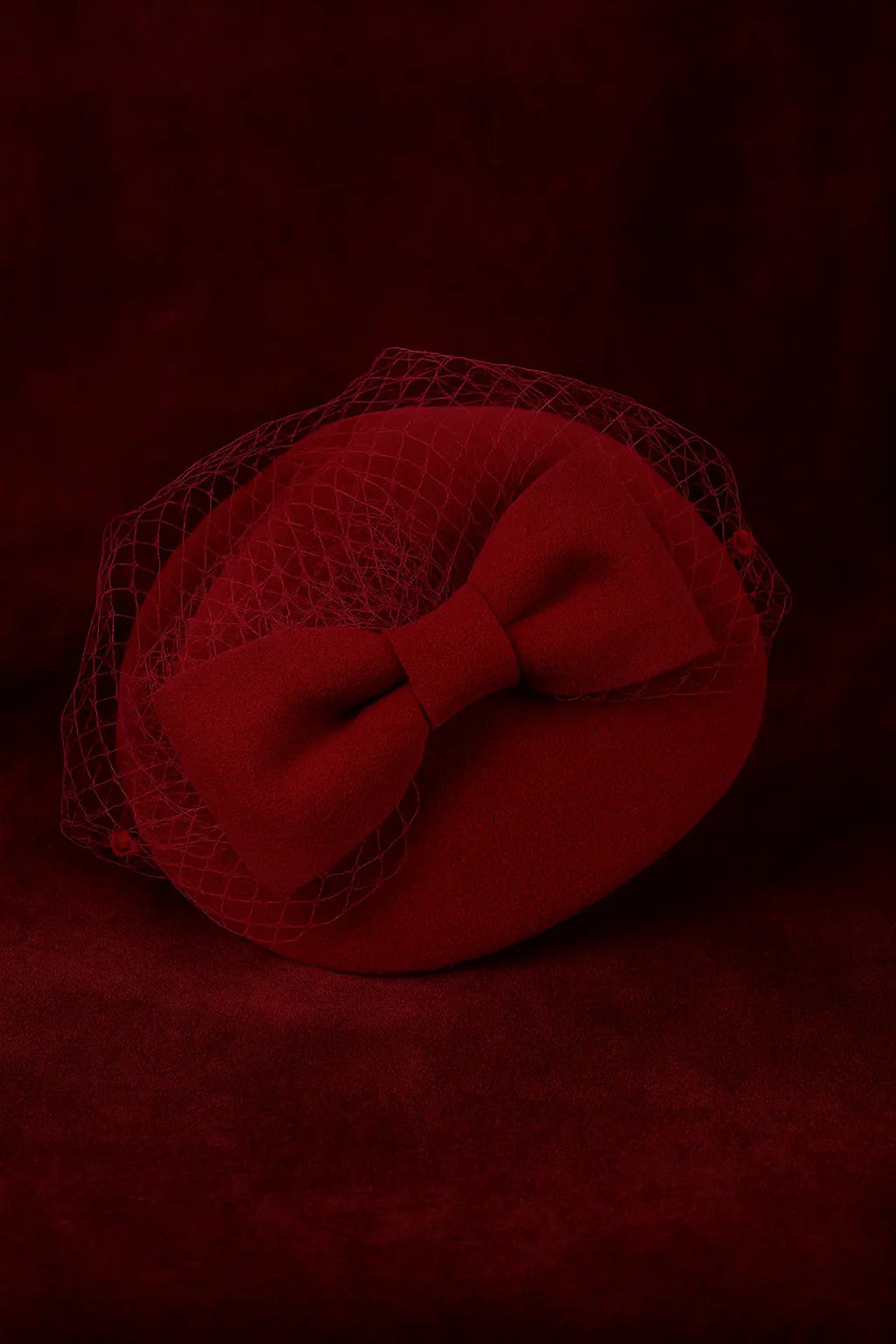 Classic red church fascinator with French veil and felt bow