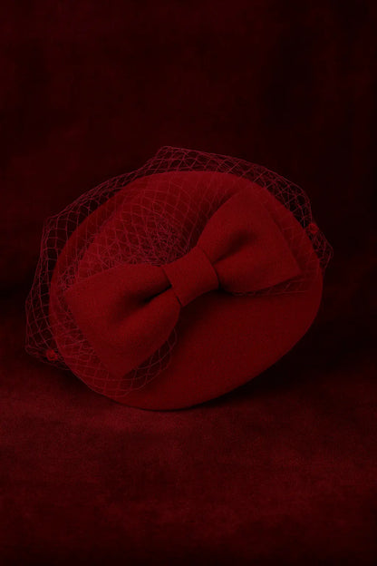 Classic red church fascinator with French veil and felt bow