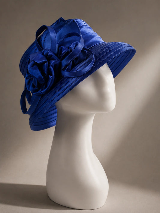 Royal blue satin church hat with cloche silhouette and short brim, designed for elegant women’s formal and church wear.