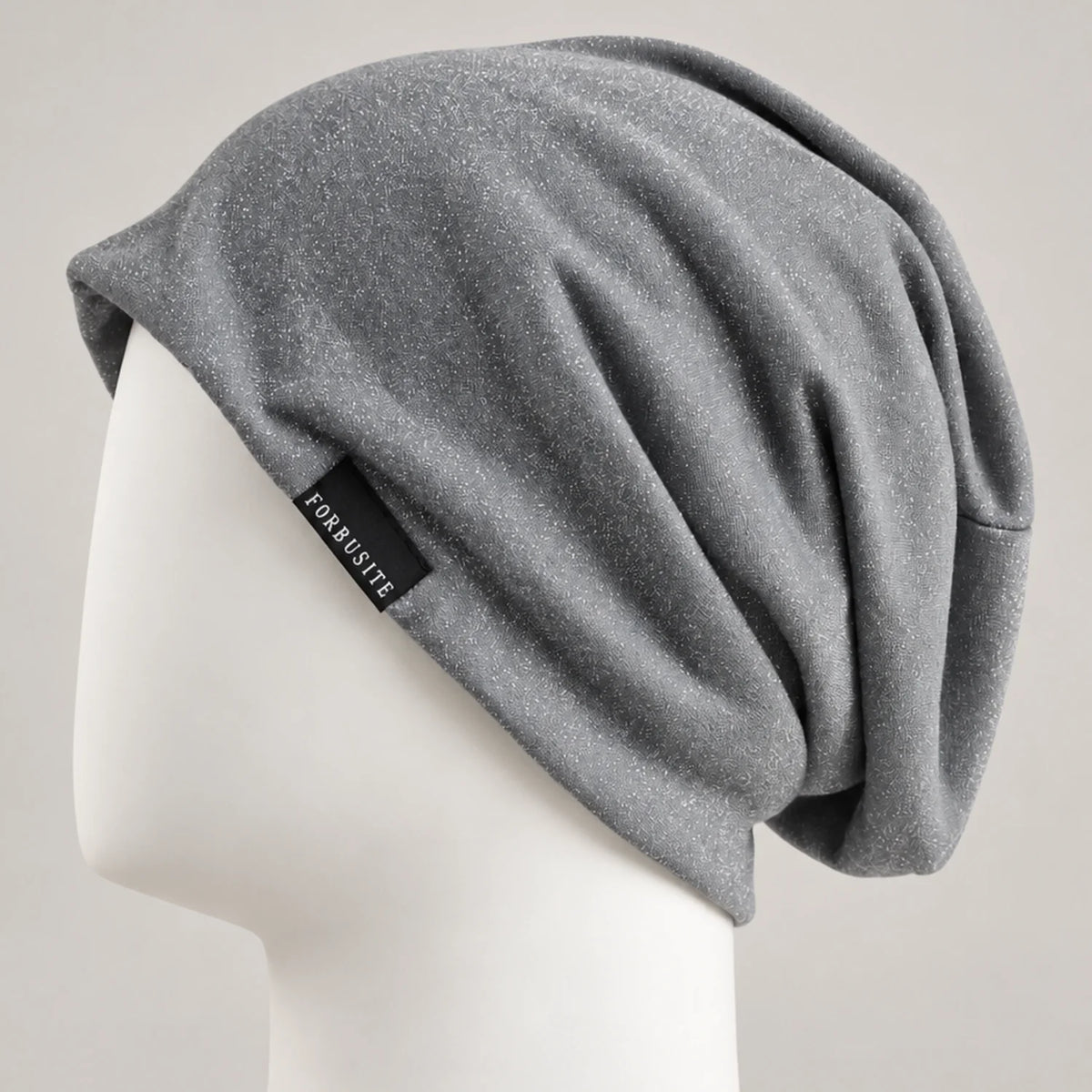Gray lightweight slouchy beanie with subtle speckled texture and soft relaxed fit