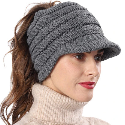 Women grey knit winter visor cap with fleece lining, messy bun ponytail opening design, warm street outfit hat for cold season