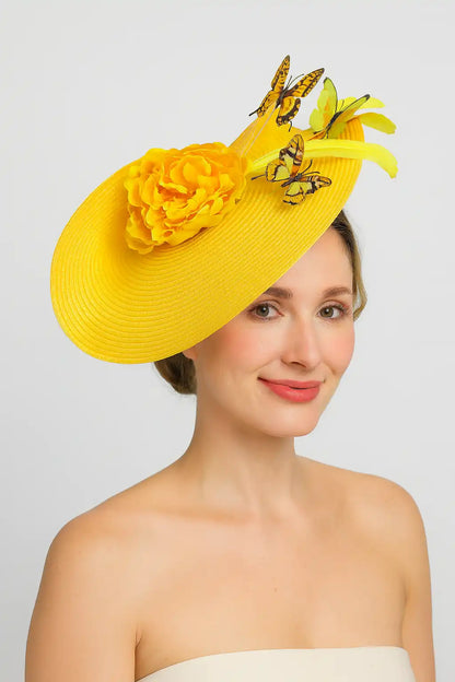 Yellow fascinator hat with butterflies and flower, perfect for derby events