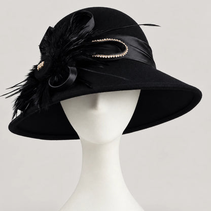 Black feather-trimmed church hat displayed on a white mannequin