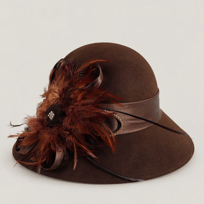Brown wool church hat with feather, ribbon and rhinestone detail, shown at a three-quarter angle