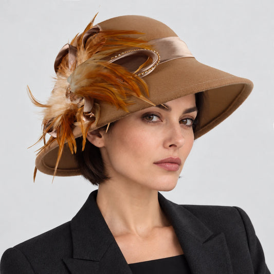 Woman wearing the camel Z025M wool church hat with feather, satin ribbon and rhinestone trim