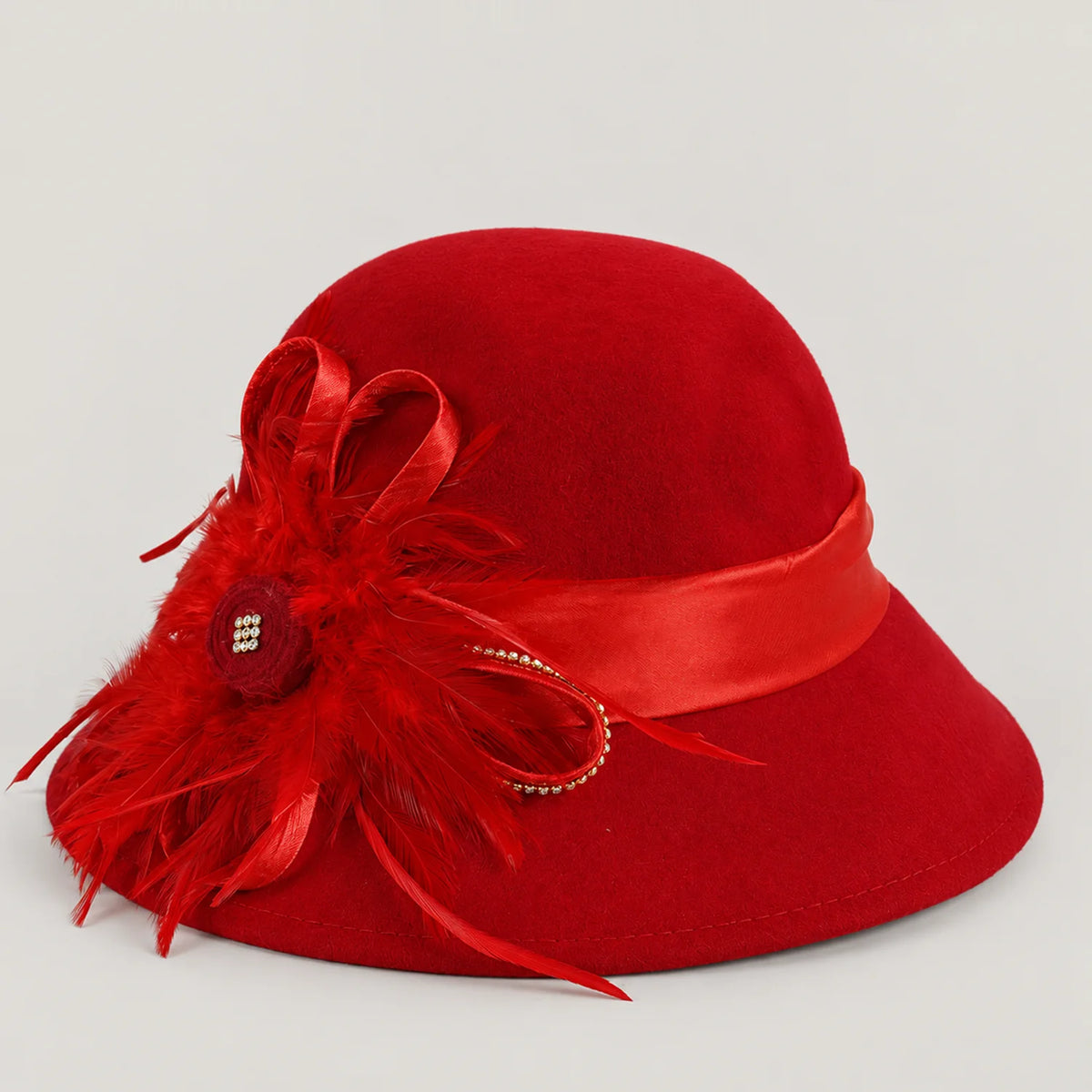 Red wool church hat with matching feather, ribbon and rhinestone detail