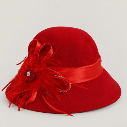 Red wool church hat with matching feather, ribbon and rhinestone detail