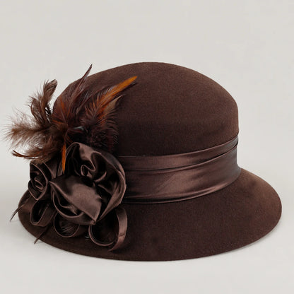 Brown Z026H dress hat showing its curved brim, ribbon band and side decoration