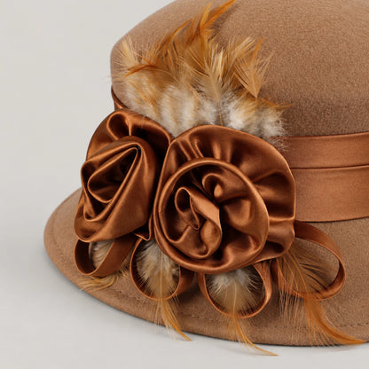 Close-up of satin ribbon flowers and feathers on the camel Z026H hat