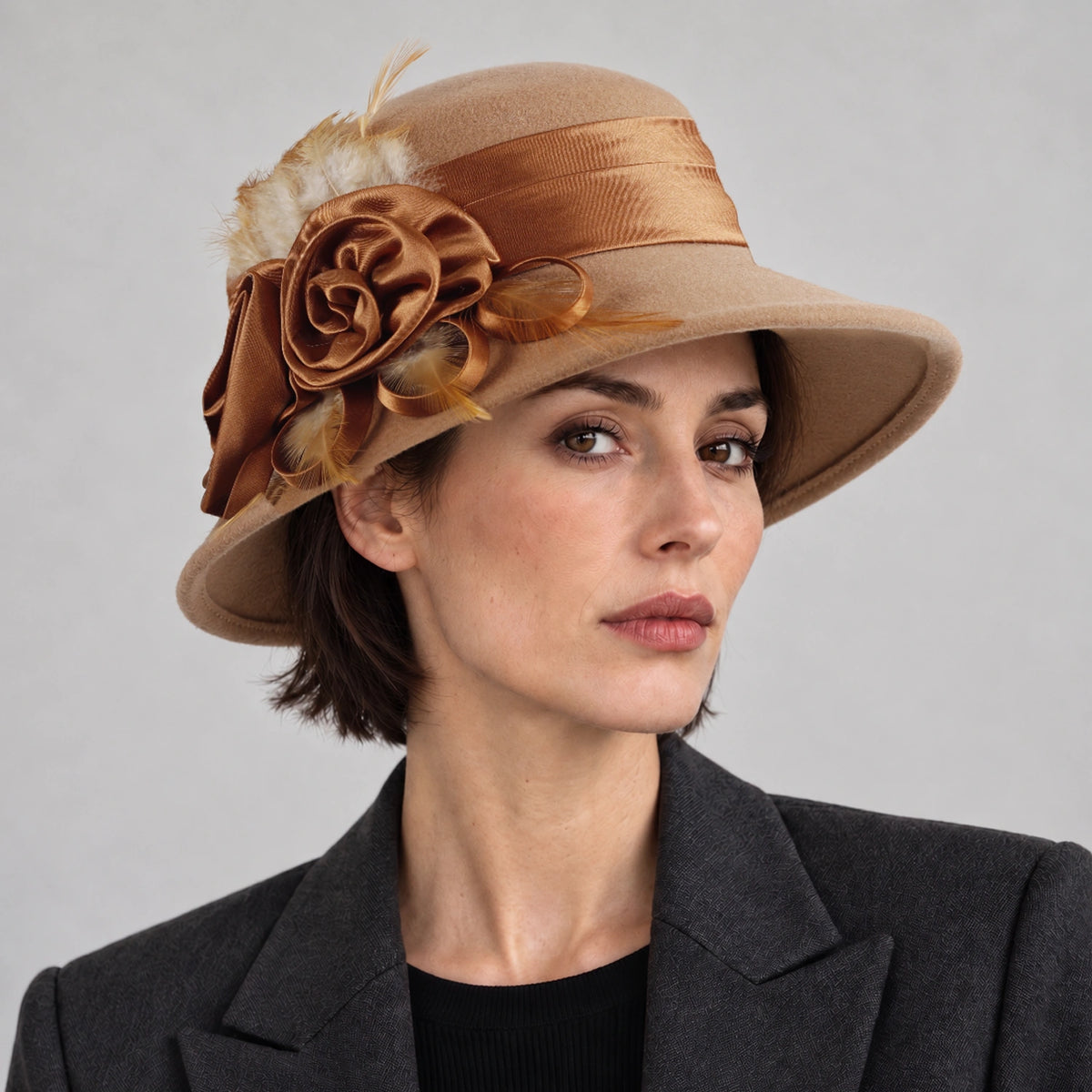 Woman wearing the camel Z026H wool church hat with satin flowers and feathers