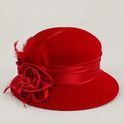 Red Z026H wool hat with ribbon flowers and feather accents, displayed without a mannequin