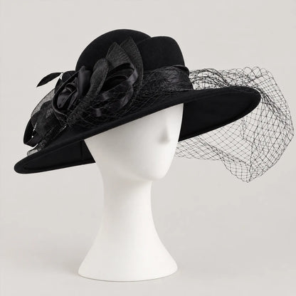 Black Z029B hat on a white mannequin with a side flower and mesh veil extending beyond the brim.