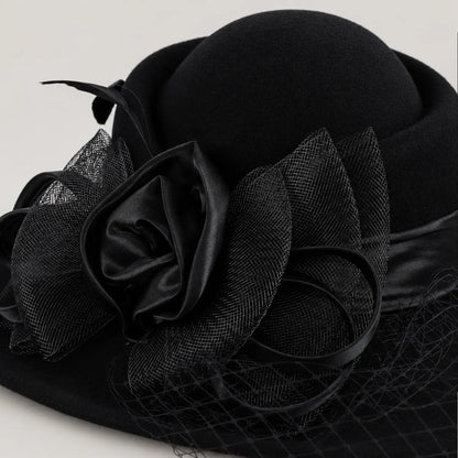 Close view of the black layered ribbon flower and mesh veil on the Z029B hat.