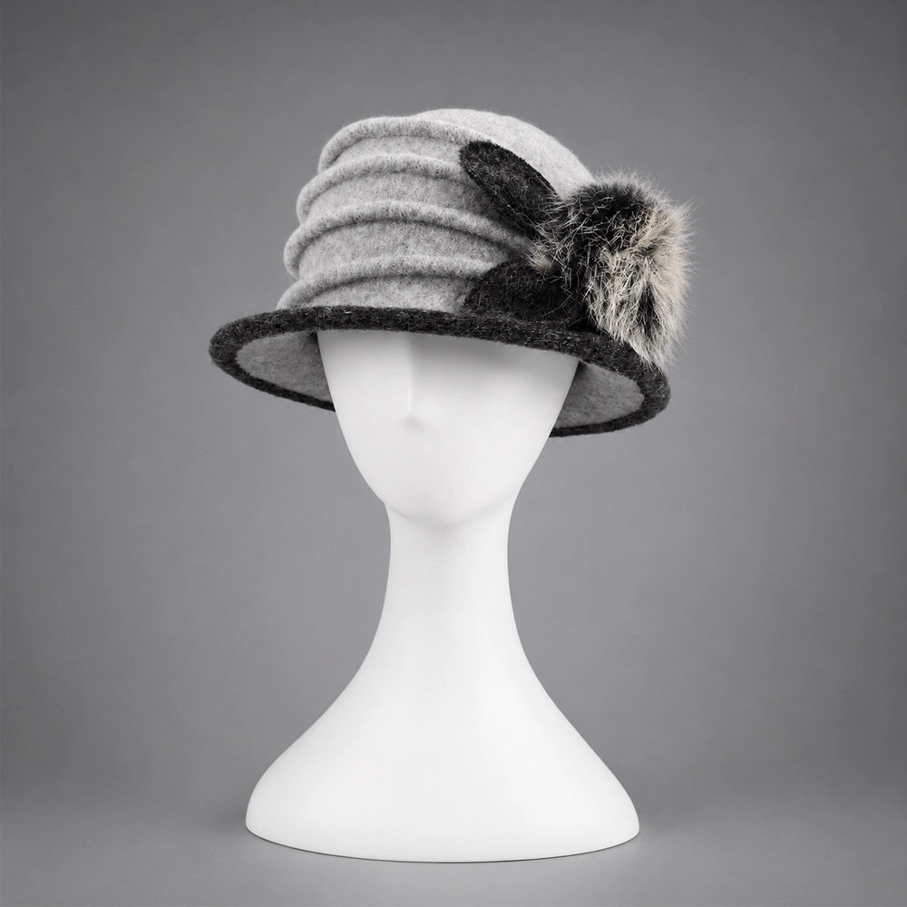 Front view of a gray boiled wool cloche hat with a short contrasting brim