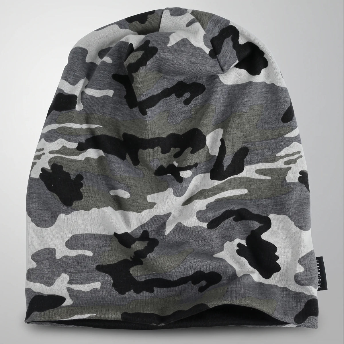 Gray camo slouchy beanie laid flat with a relaxed extended crown