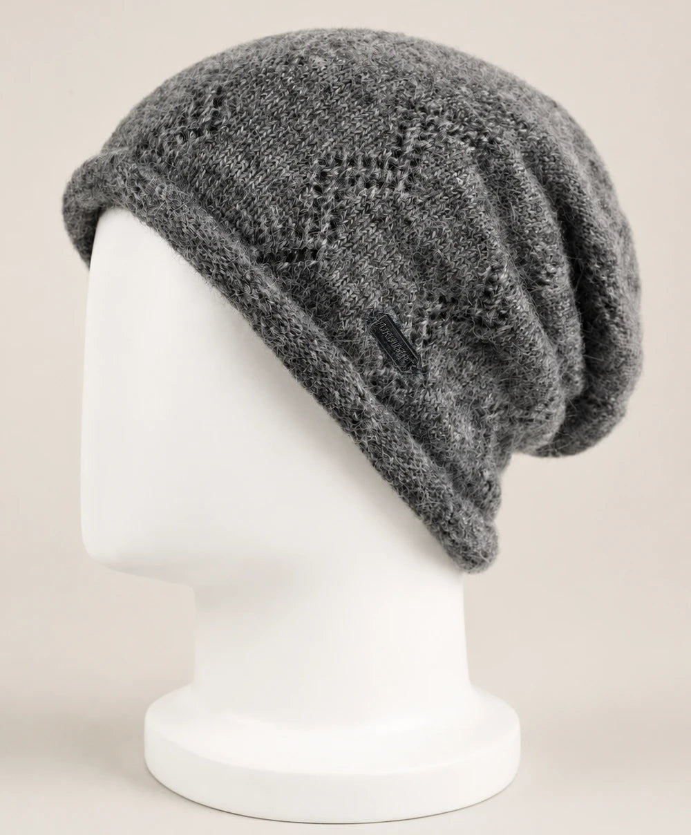 Side view of gray rolled-edge slouchy beanie on display head
