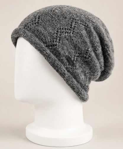 Side view of gray rolled-edge slouchy beanie on display head