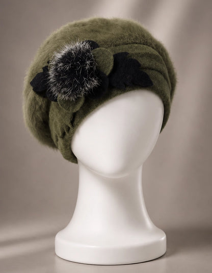 Green angora wool beret hat with flower detail for warm winter styling