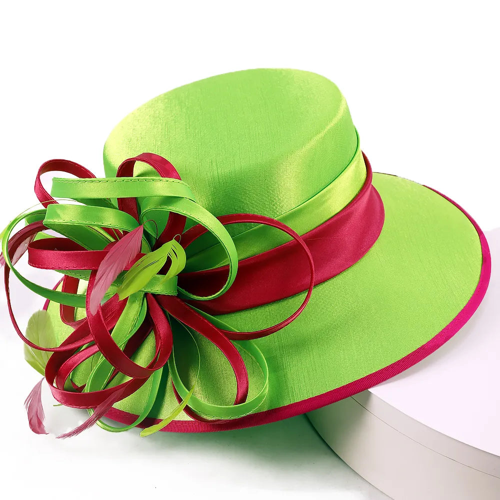 Rear view of green and fuchsia church hat with layered satin bow and feathers – FORBUSITE