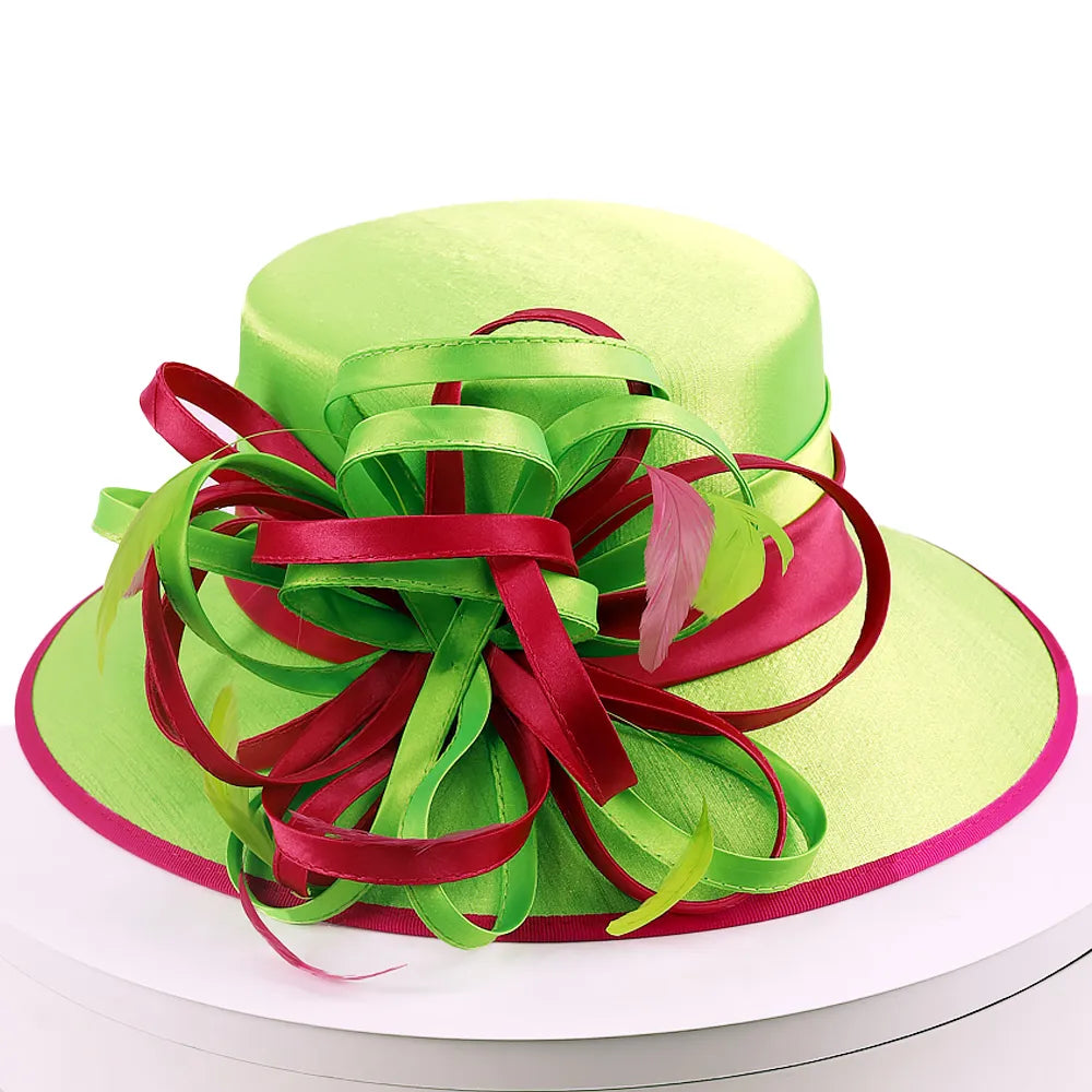 Rear view of green and fuchsia church hat with layered satin bow and feathers – FORBUSITE