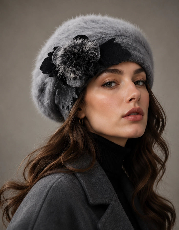 Grey angora wool beret with black flower accent for elegant winter outfit