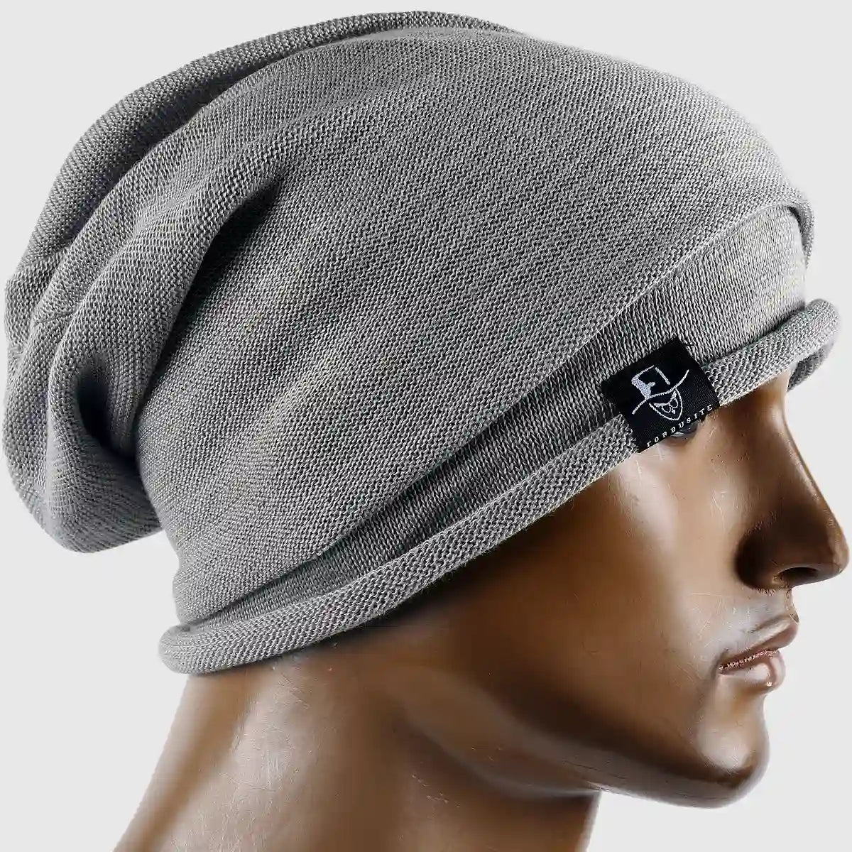 Grey beanie hat for men and women, soft knit fabric, stylish and functional for all seasons, breathable and comfortable casual wear.