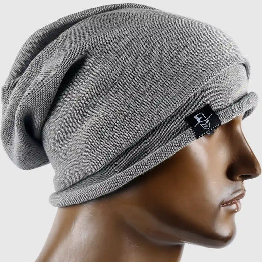 Grey beanie hat for men and women, soft knit fabric, stylish and functional for all seasons, breathable and comfortable casual wear.