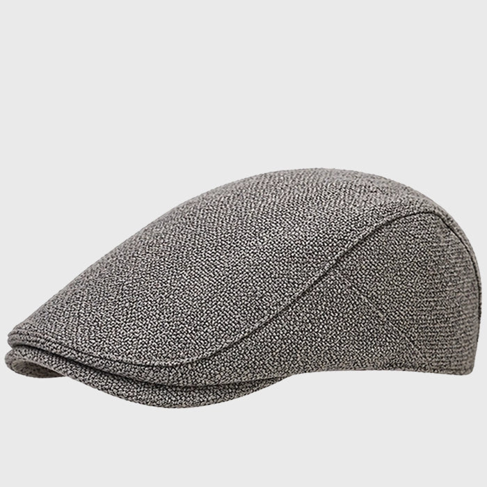 Grey flat cap with an Ivy cap design, perfect for both men and women. Made from POLYESTER fabric, ideal for adding a stylish touch to casual outfits