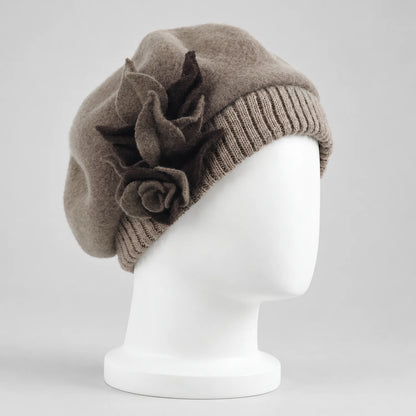 Taupe floral beret on a white mannequin, three-quarter view