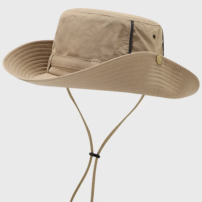 Khaki boonie hat with a wide brim and chin strap. Ideal for sun protection and comfort during outdoor activities like camping and hiking.
