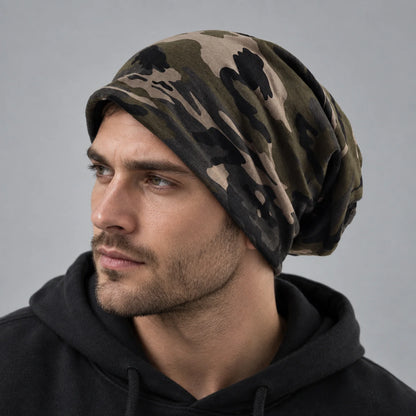 Man wearing a khaki brown camo slouchy beanie in side view