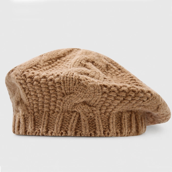 Khaki crochet cable knit beret for women, providing both style and warmth. Adjustable size for a custom fit. Ideal for adding sophistication to winter wear.