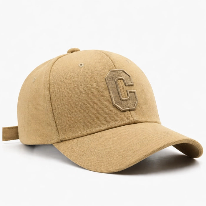 Khaki cotton baseball cap with 'C' logo embroidery, perfect for a stylish, laid-back vibe.
