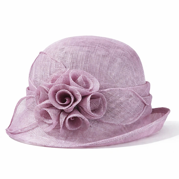 Beautiful purple cloche sinamay hat with floral accents, perfect for spring and summer weddings, tea parties, and formal gatherings.