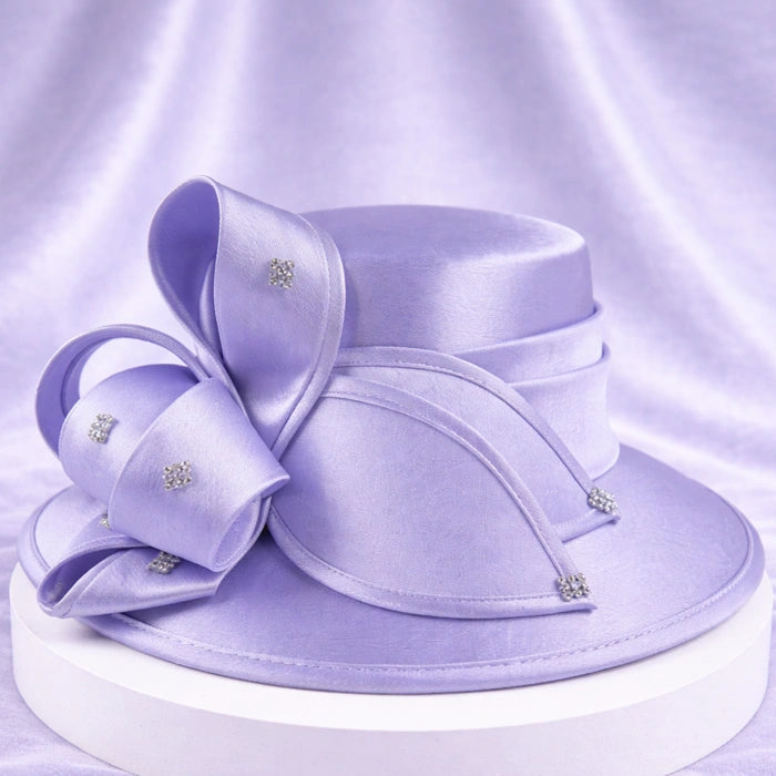Elegant lavender satin church hat with crystal decorations, ideal for spring weddings and formal occasions.
