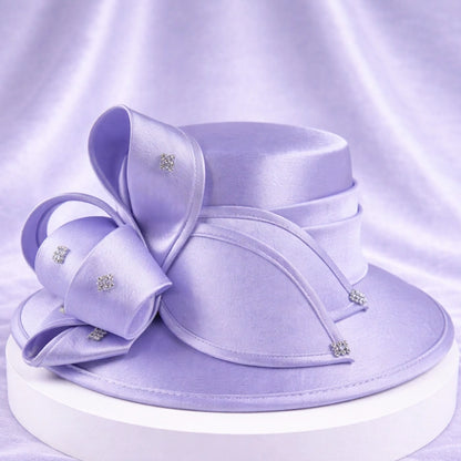 Elegant lavender satin church hat with crystal decorations, ideal for spring weddings and formal occasions.