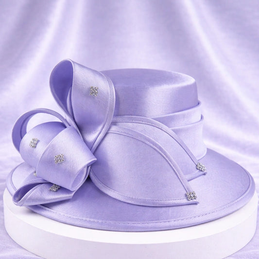 Elegant lavender satin church hat with crystal decorations, ideal for spring weddings and formal occasions.