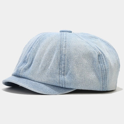 Light blue denim Newsboy cap with a vintage Baker boy hat style. Soft and stylish, perfect for adding a classic workwear touch to your casual outfits.