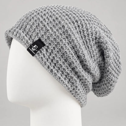 Light gray knit slouchy beanie with an open textured knit and relaxed fit