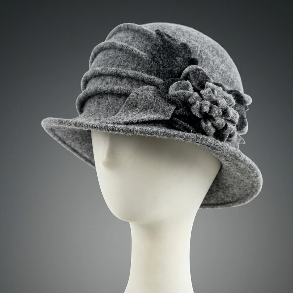 Light gray wool felt cloche hat with a layered gray floral decoration